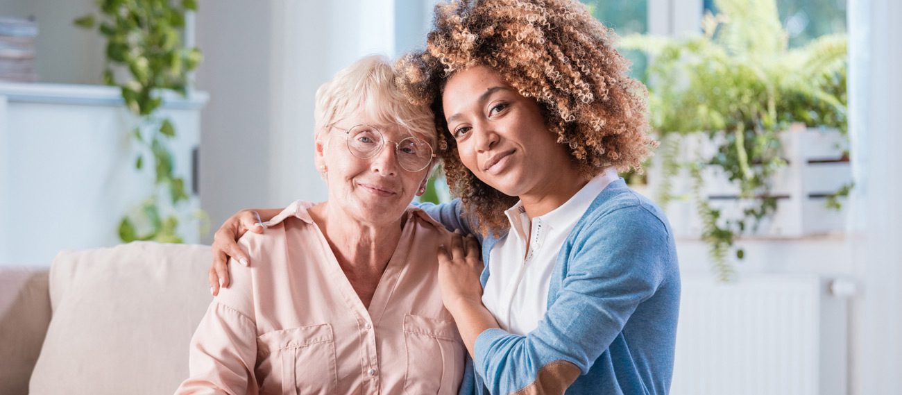 Family-caregiver-looking-after-mother-and-needing-caregiver-support