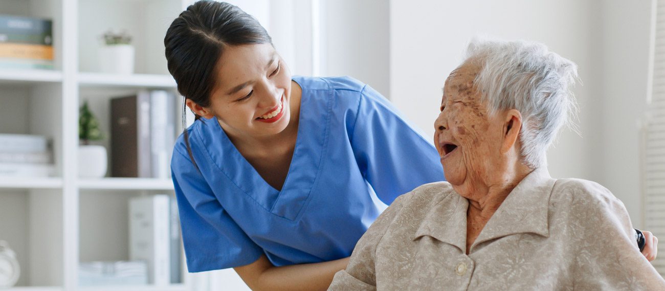 hospice-nurse-smiling-at-patient
